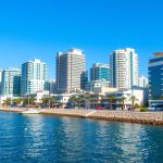 Business opportunities in Cyprus showing the Mediterranean coastline with modern office buildings
